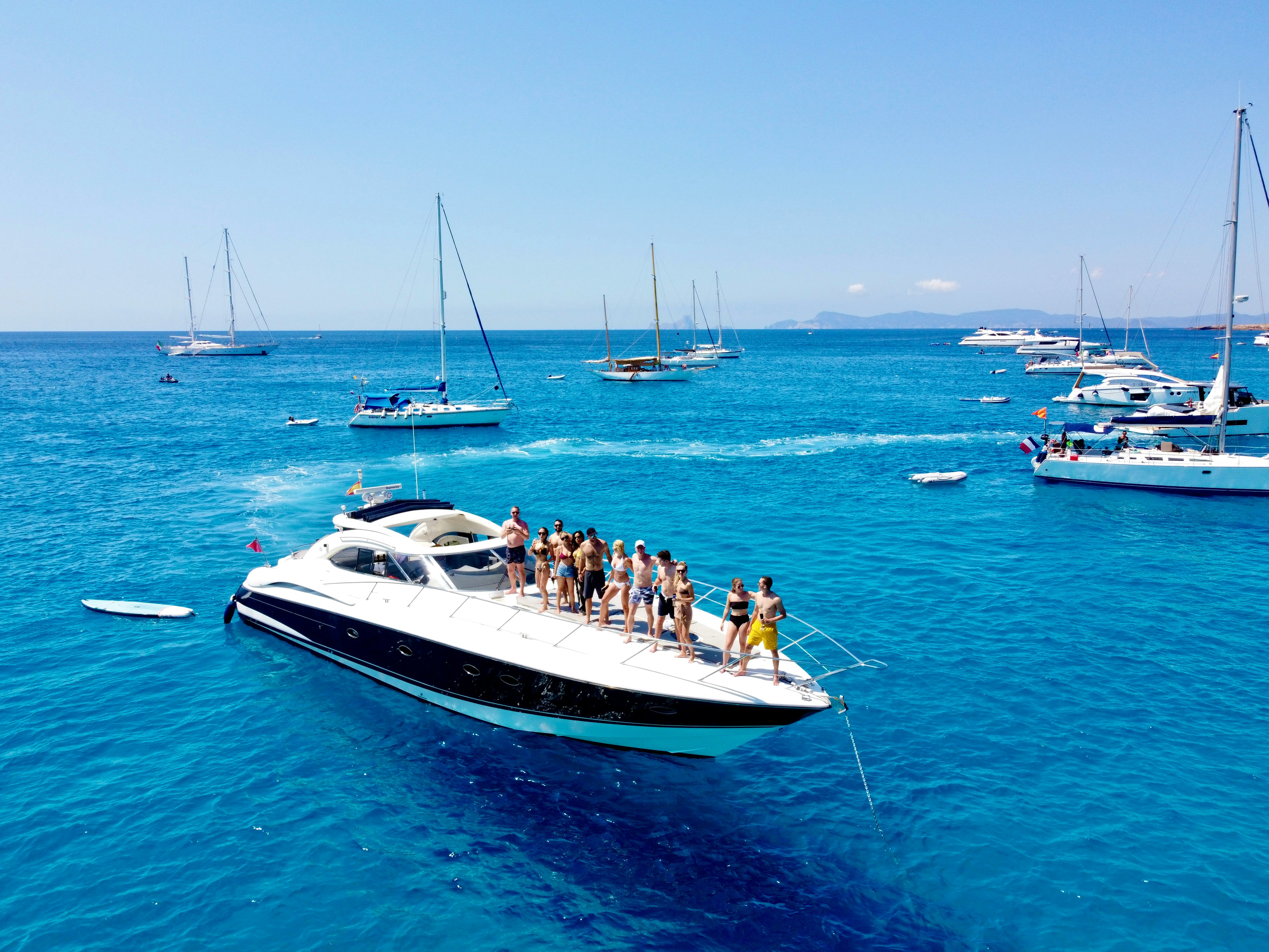 Group on a private yacht — the kind of VIP experience that defines a well-run corporate incentive trip