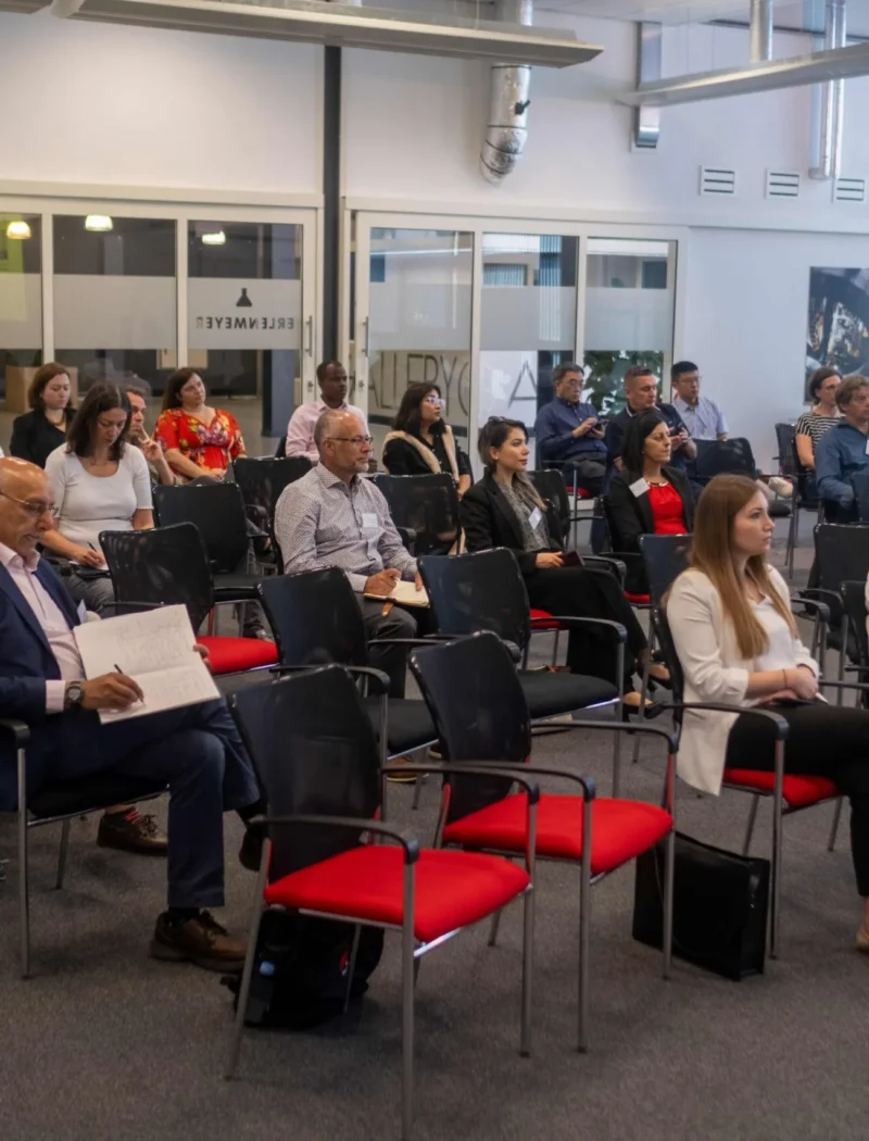 conference management checklist UK — international conference delegates in session