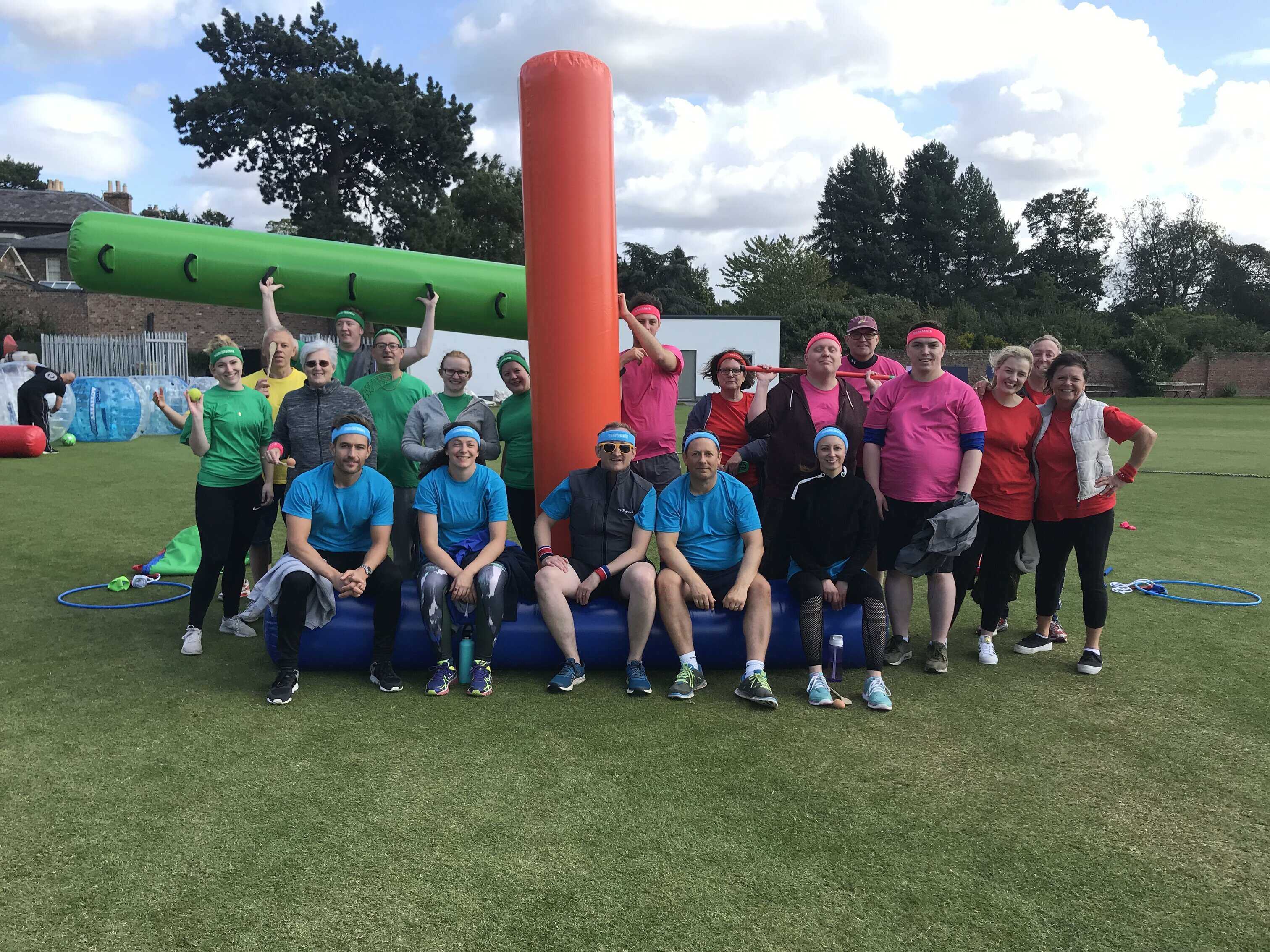 team building ideas for corporate events — inflatable outdoor team activity